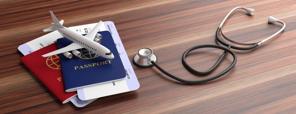 a picture of passport and stethoscope