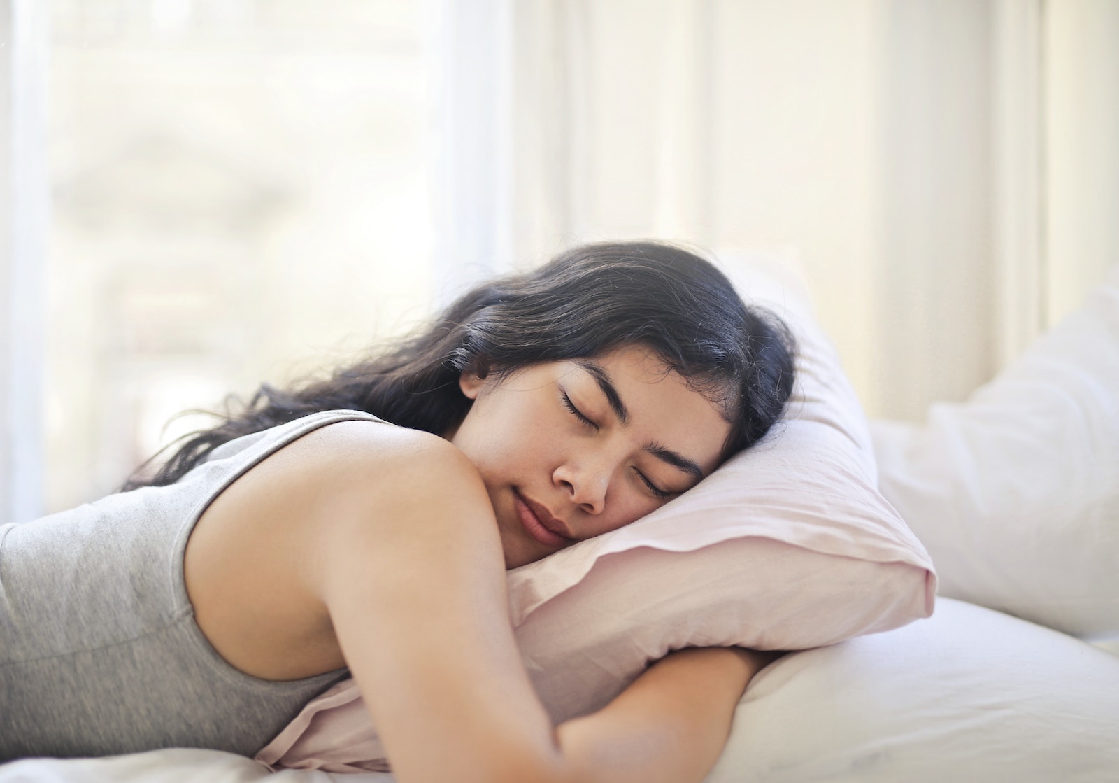 The Link Between Exercise and Sleep woman sleeping