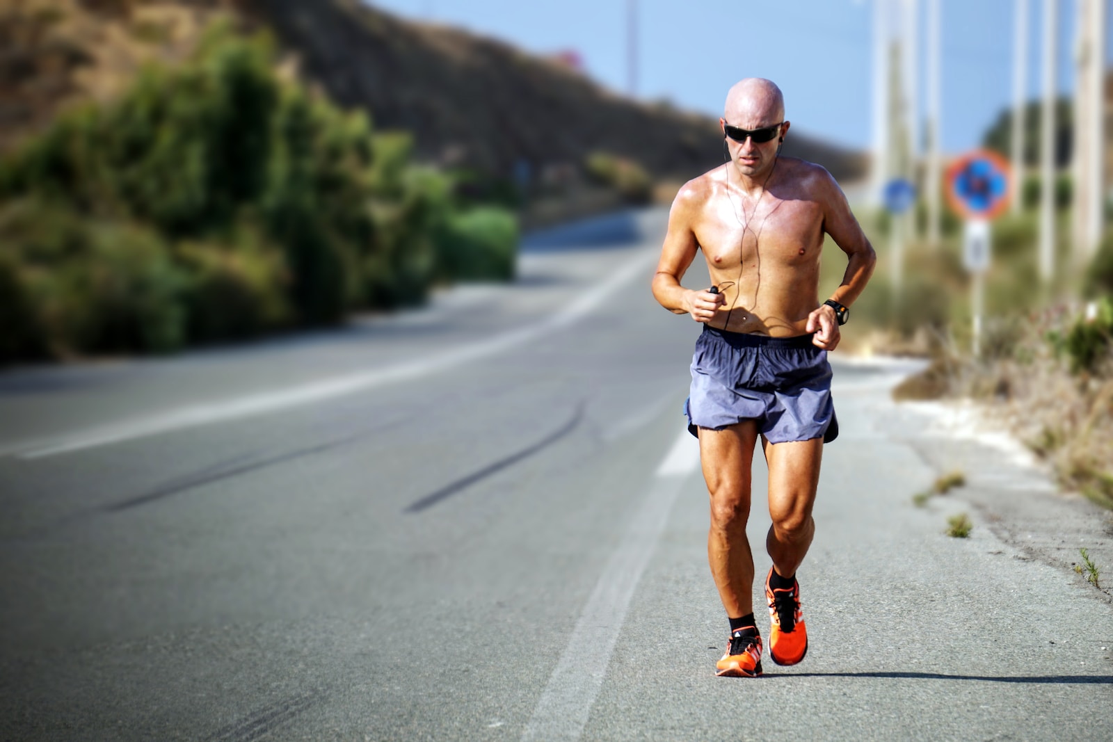 man jogging during daytime