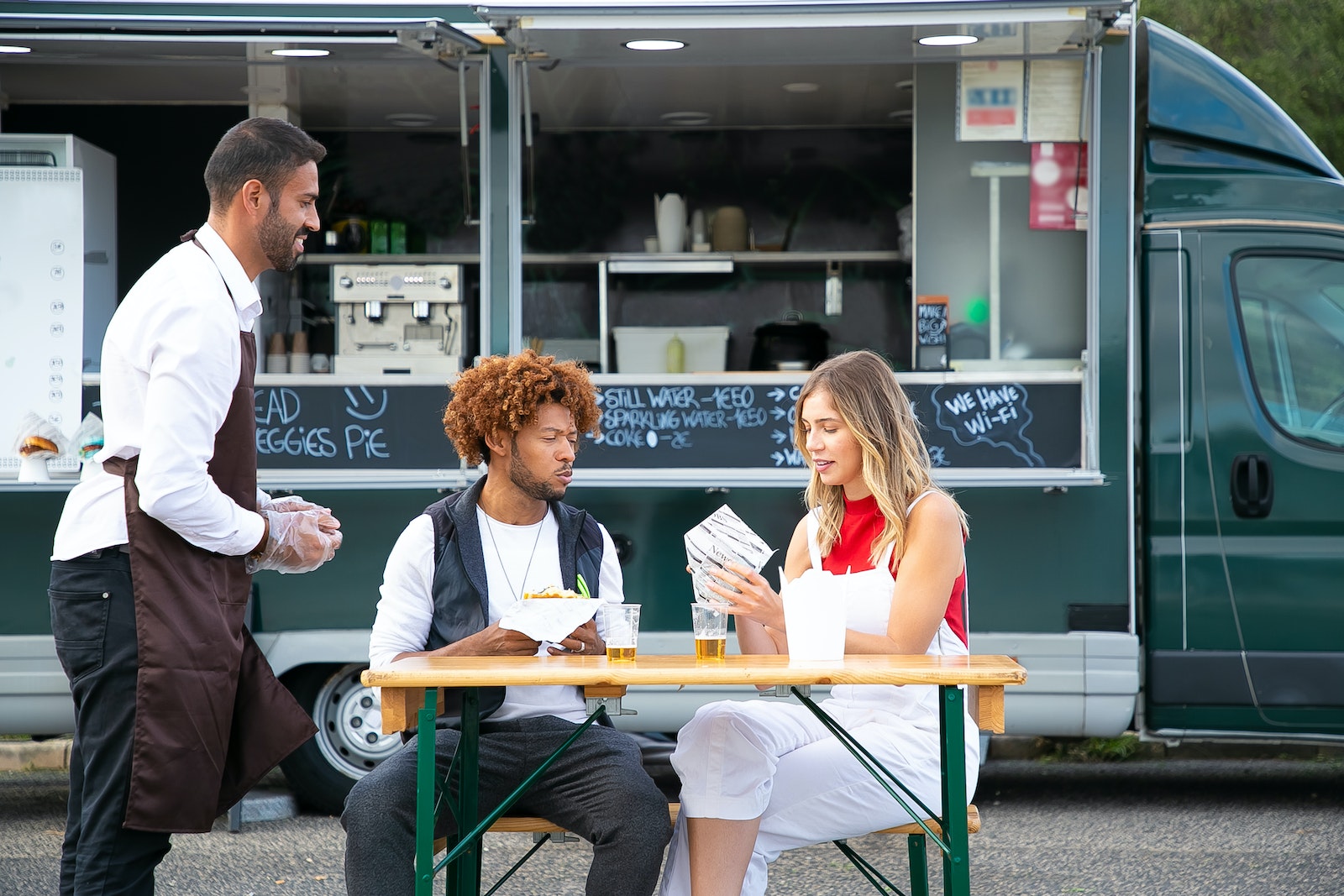 two person eating outside