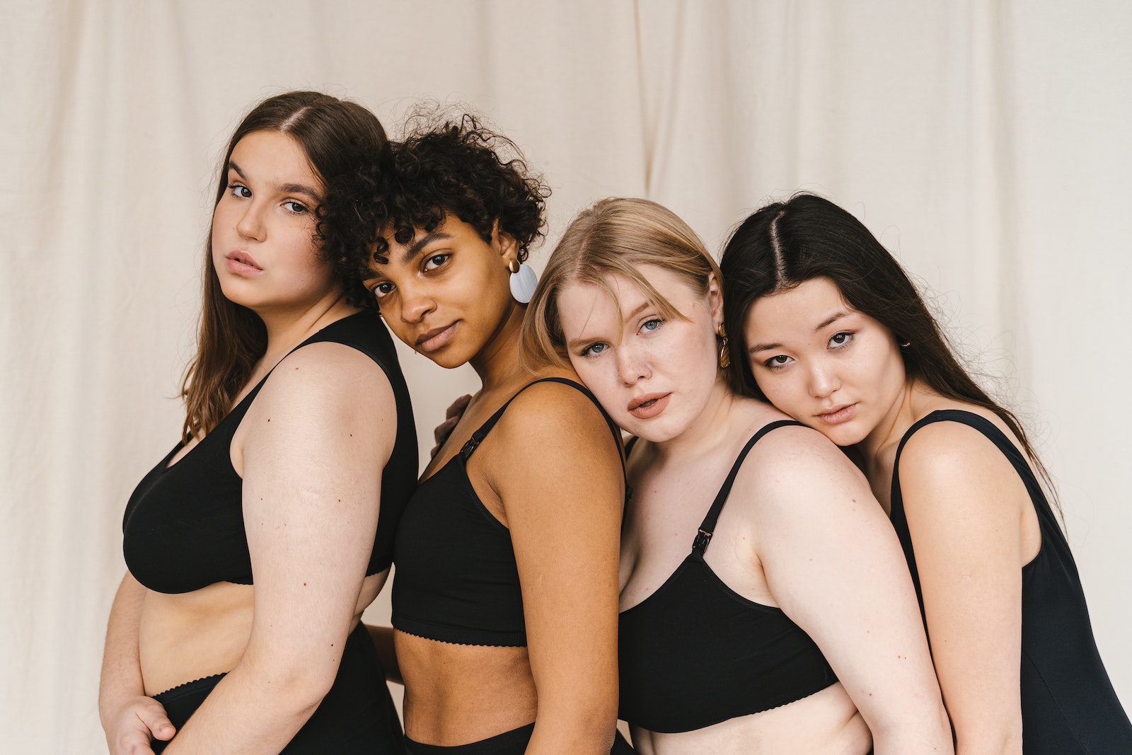 A Group of Women in Black Swimsuit