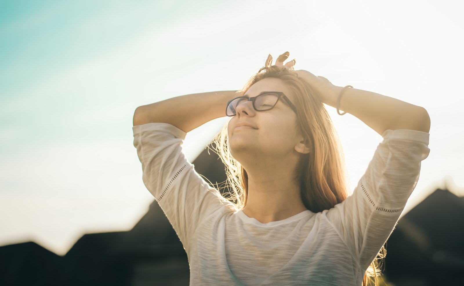 Woman Holding Her Head