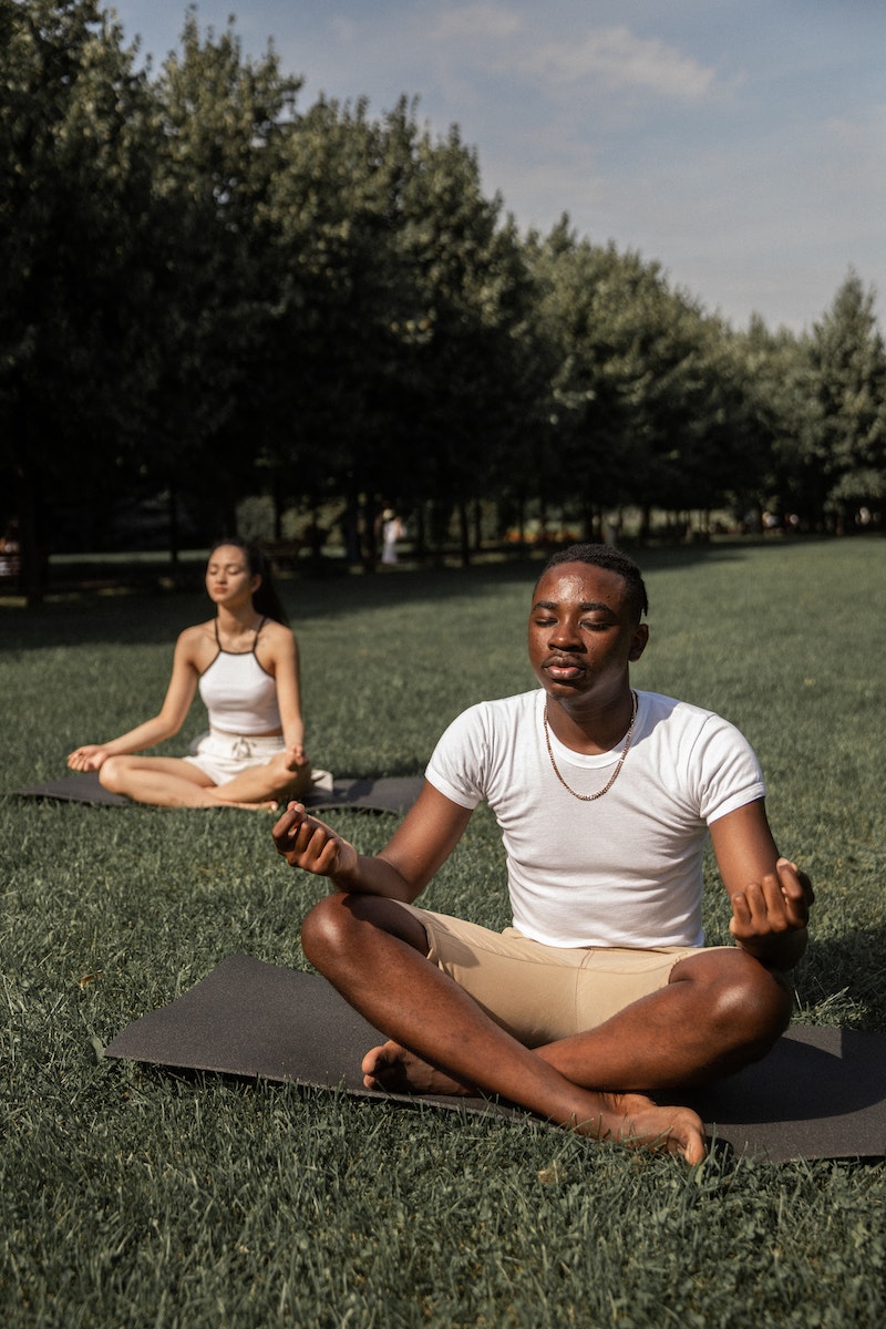 Couple while practicing yoga together