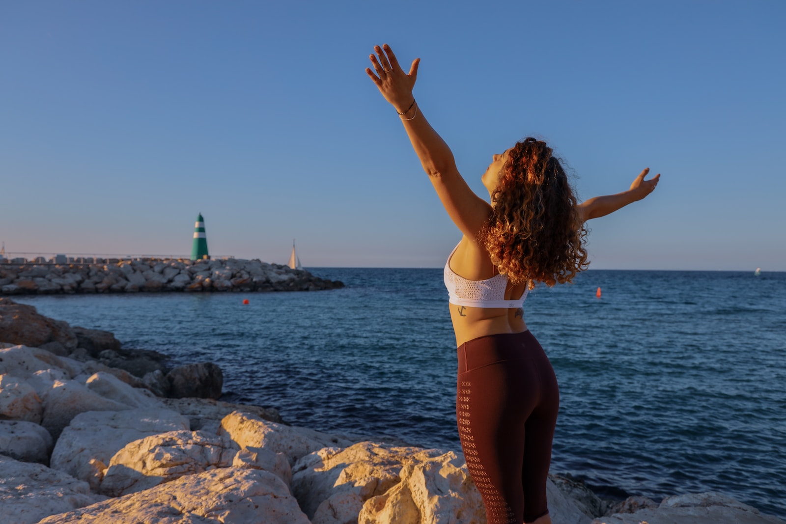 woman standing on seashore