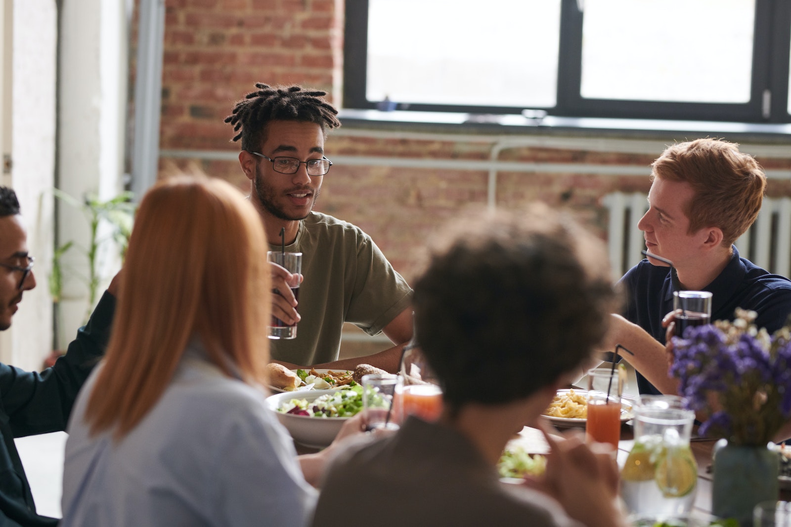 Group of Person Eating Indoors