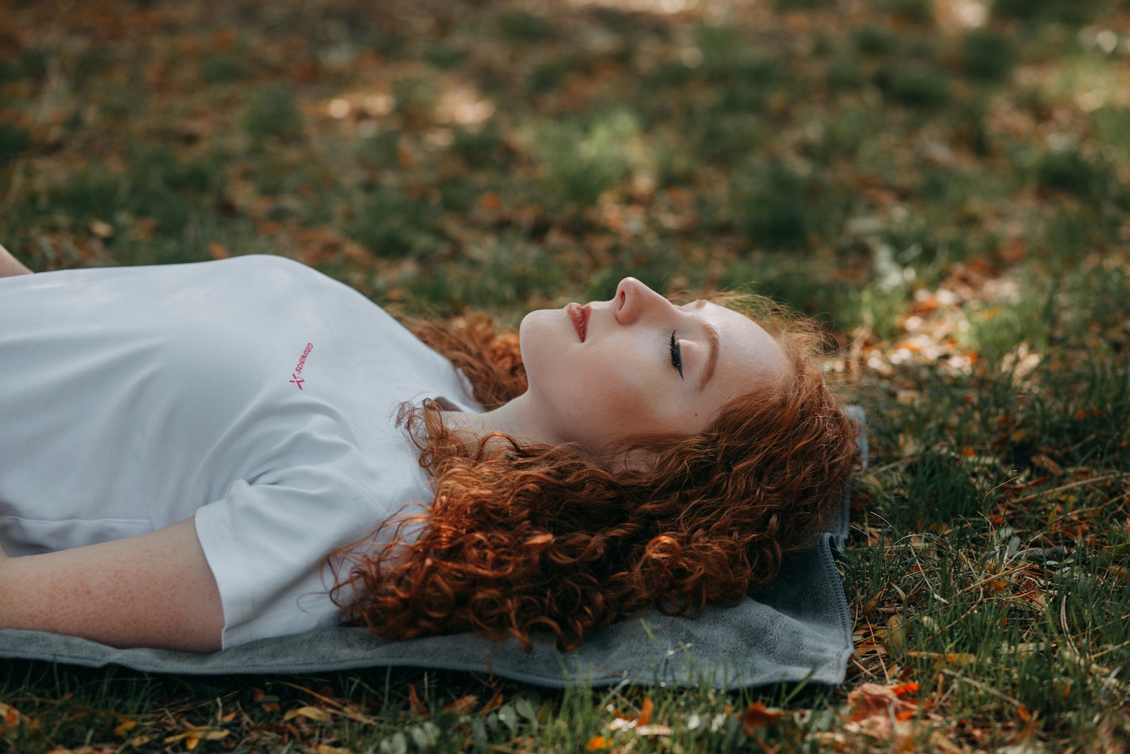 Woman Laying On Ground